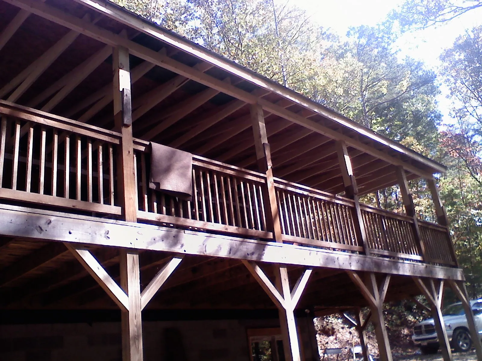 Timber framing under a new elevated porch and deck — Roof Leak Repair in Shrewsbury by Roofing Brothers